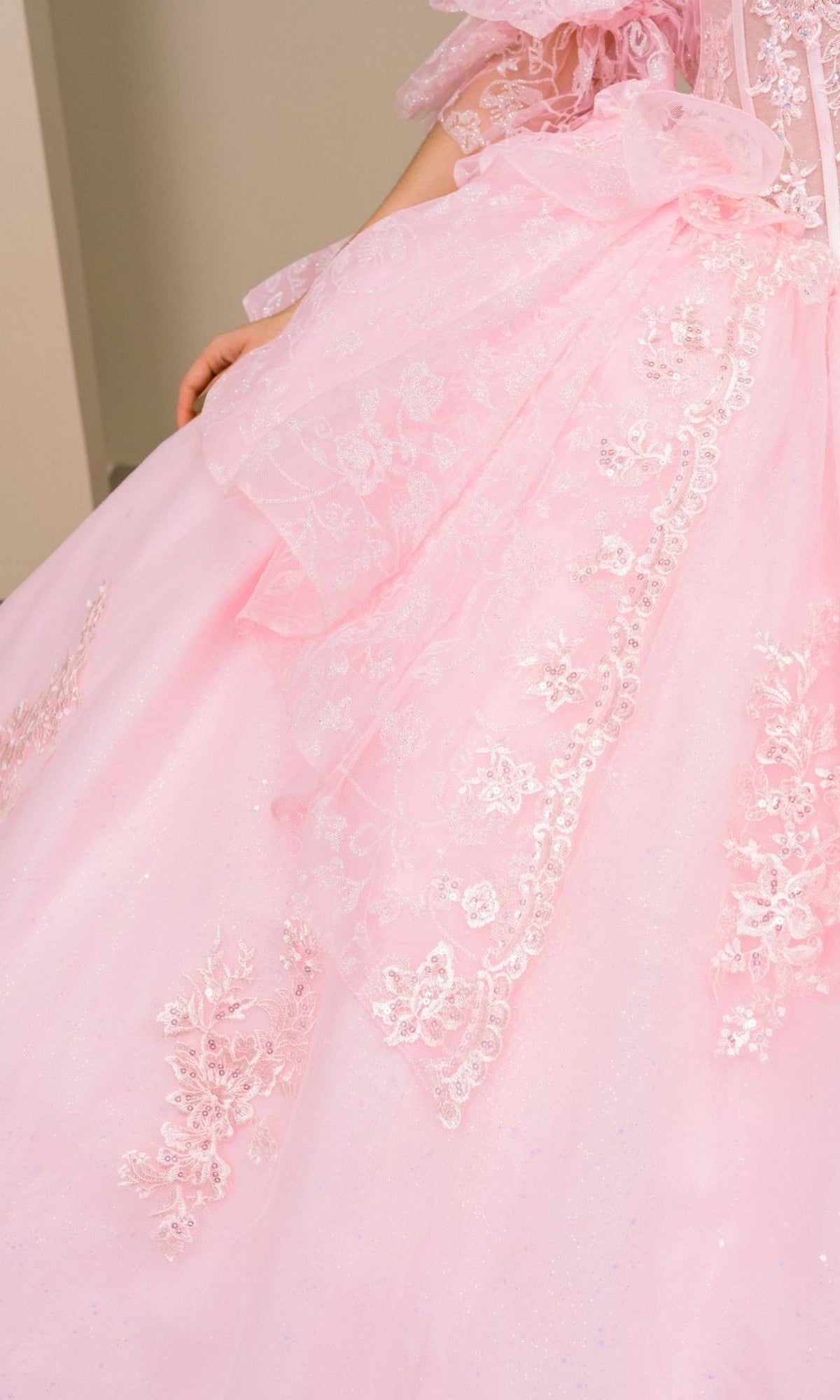 Close-up of the Quinceanera Dress 8535JQ by Cinderella Couture, featuring lace and sequin floral details on the bodice and full skirt.